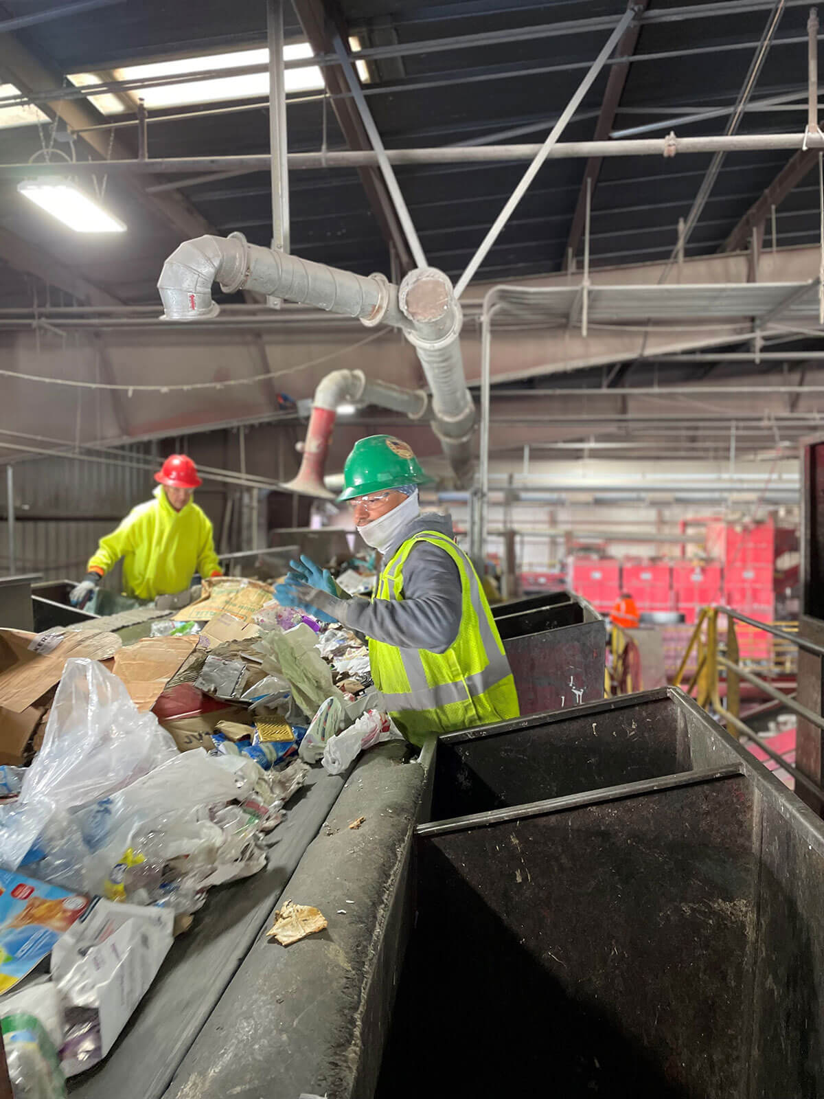 workers sorting recyclables